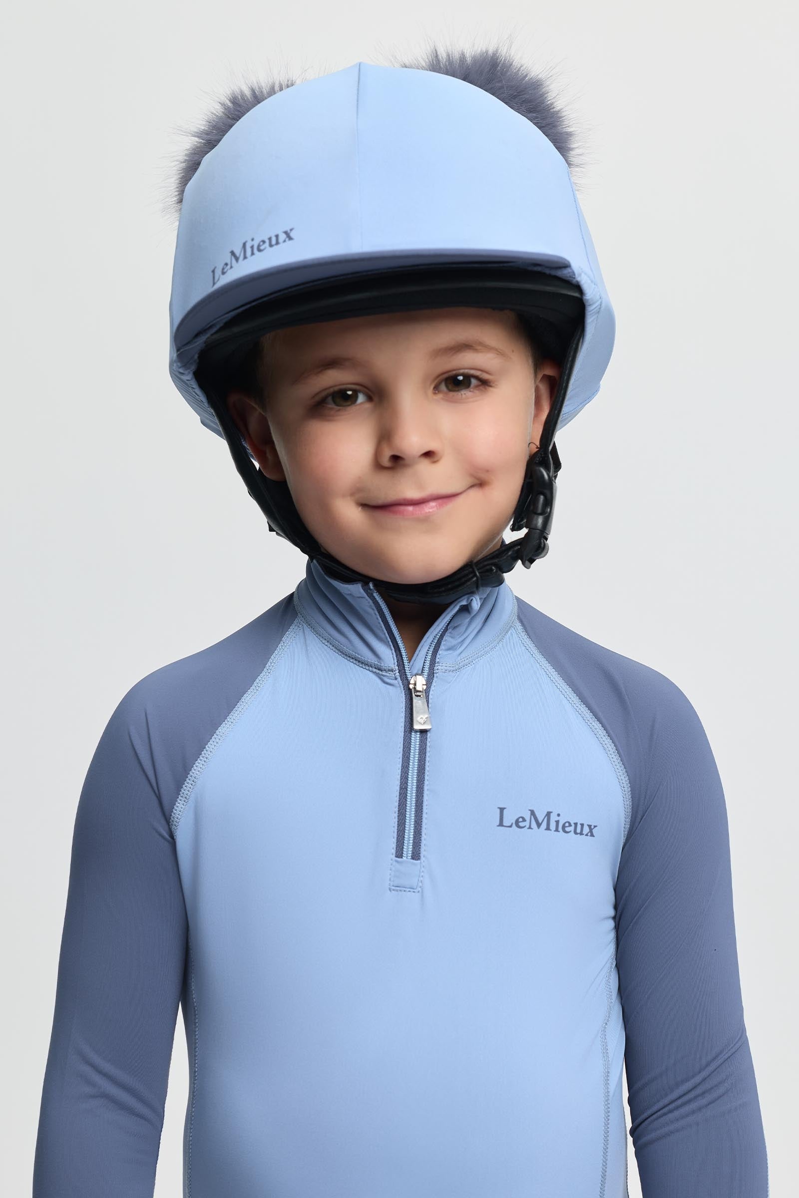 LeMieux Mini funda para casco con doble pompón Ropa Niños